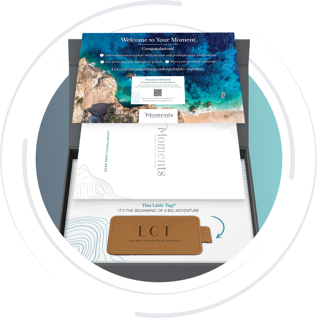 Moments reward box with a luxe travel gift and trip portal card